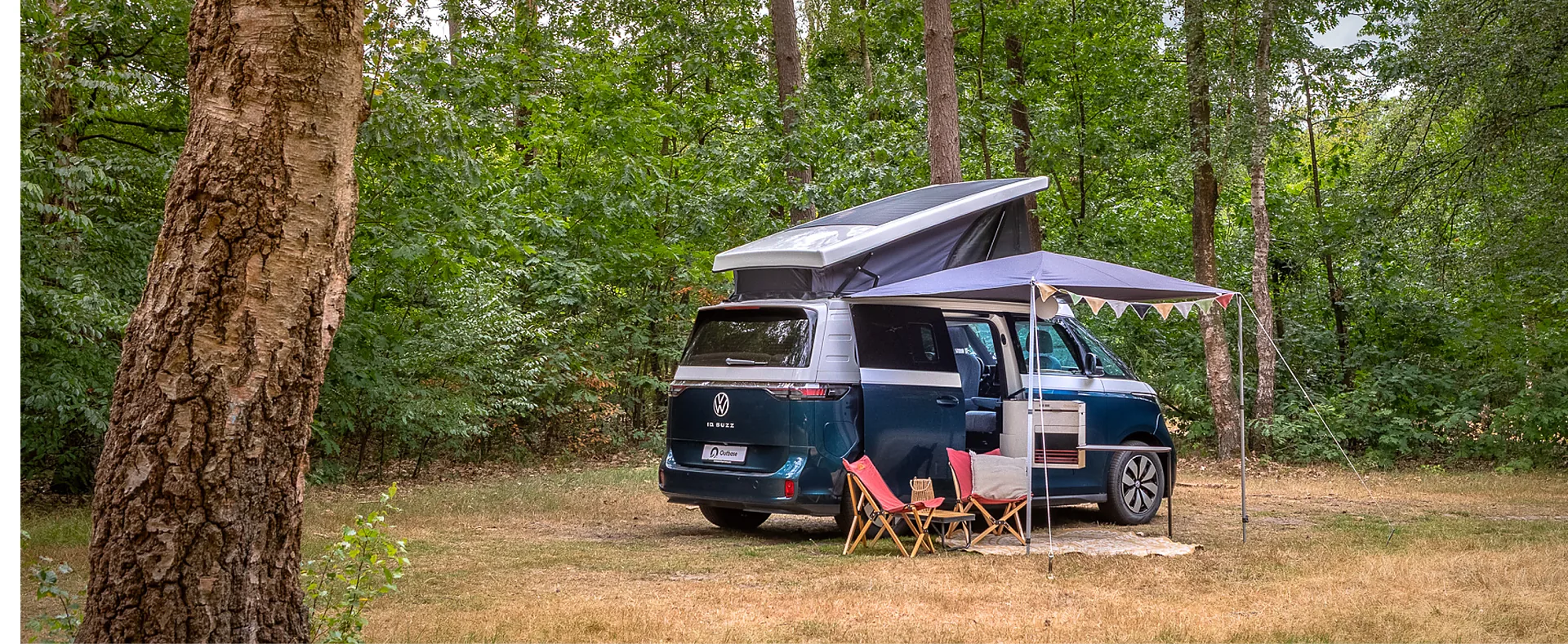 Outbase Delta bij een boom in het bos
