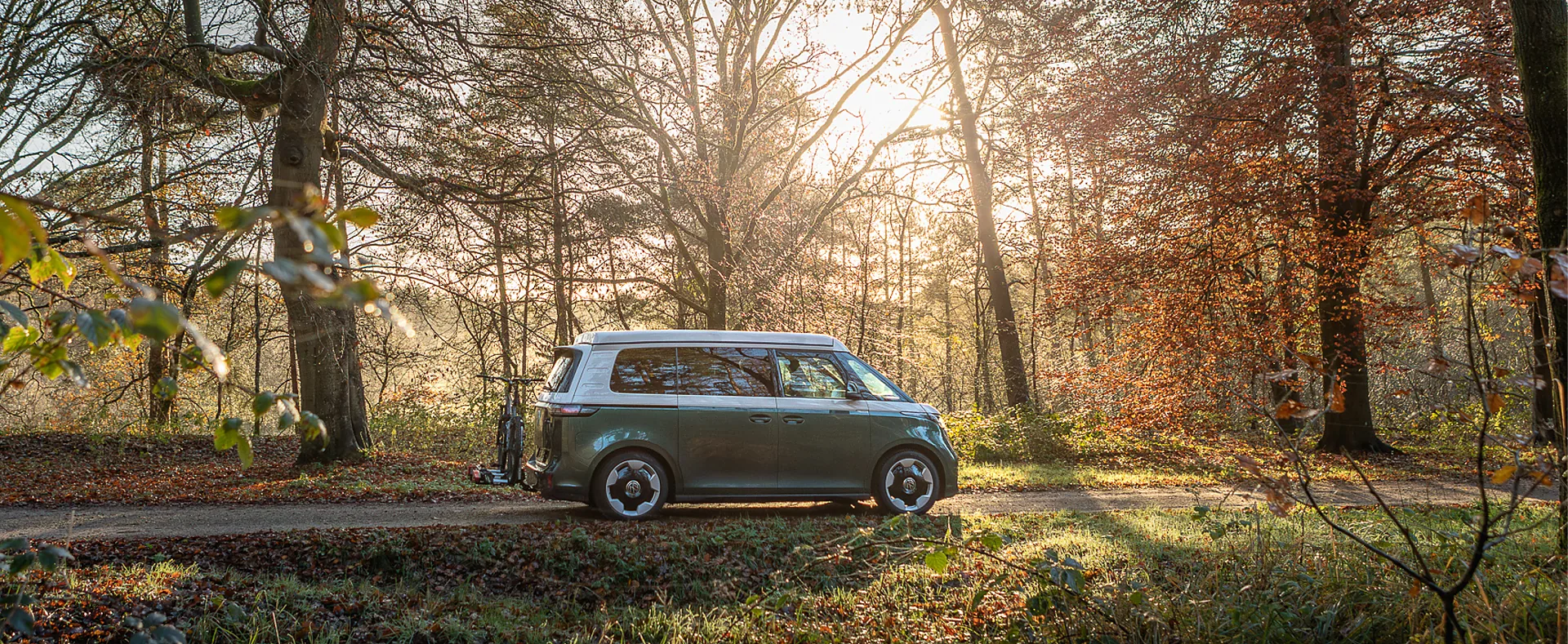 Outbase campervan in the autumn forest